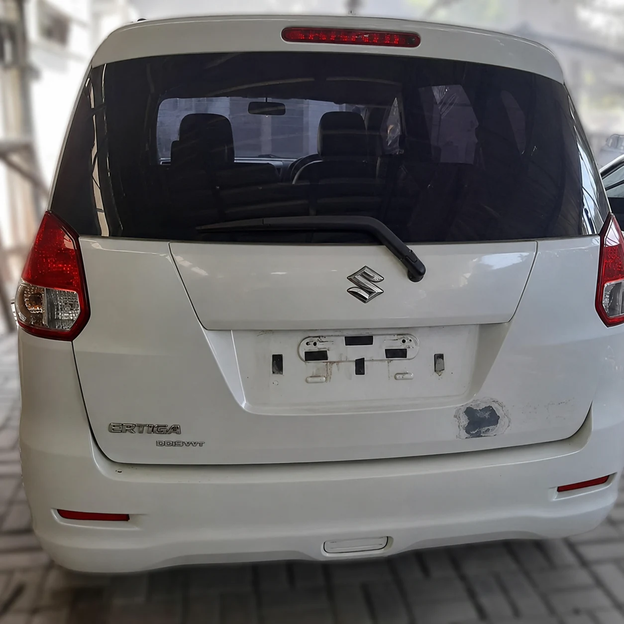 baret bumper belakang Suzuki Ertiga sebelum body repair Oke Body Repair