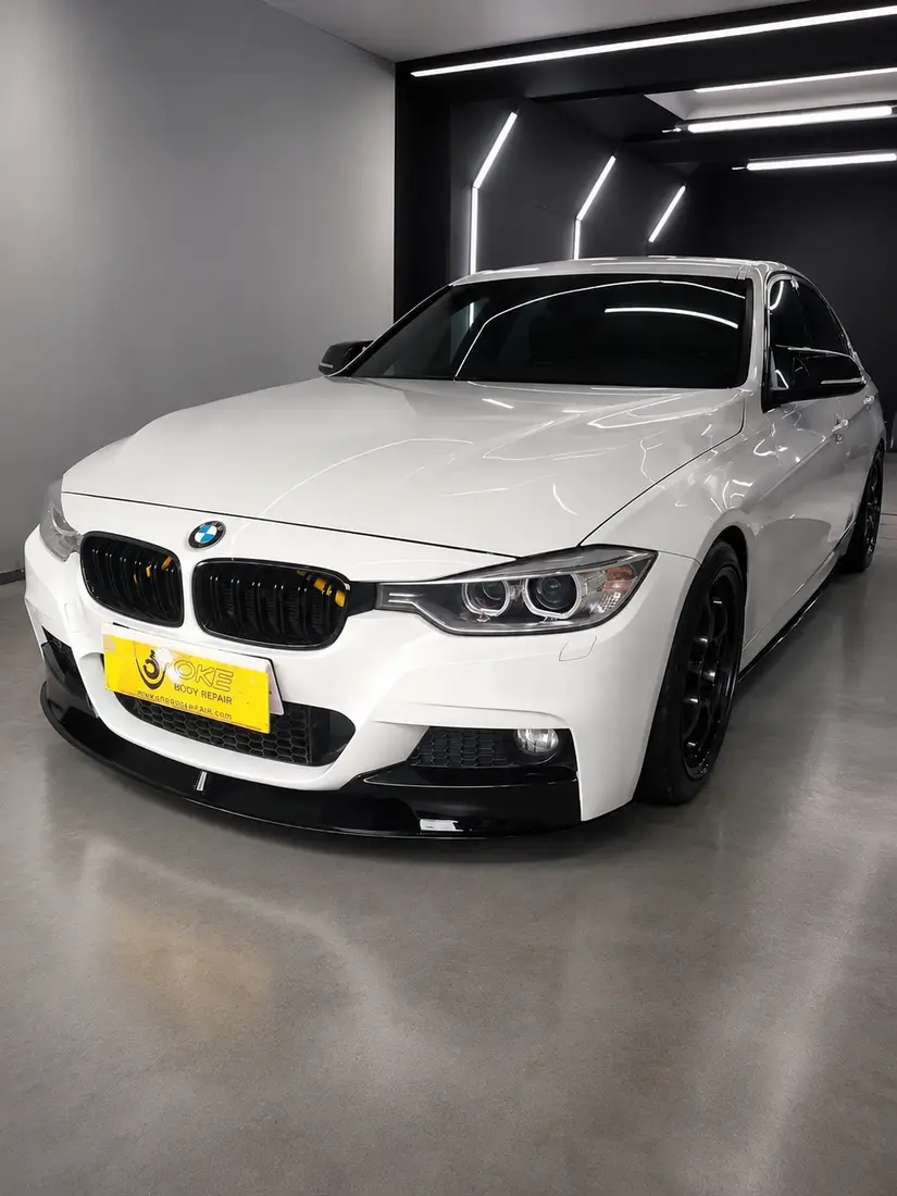 Cat mobil BMW putih clean look Oke Body Repair