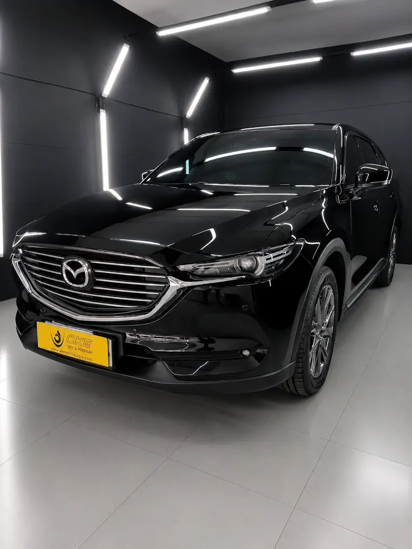 Hasil cat mobil Mazda hitam Oke Body Repair Cinere